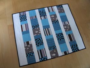 Charm Square Baby Quilt by Elizabeth Hartman